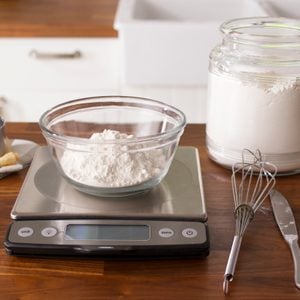 Bowl with flour on a small scale