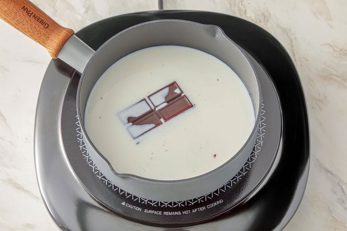 Warm milk and chocolate in a small saucepan over medium-low heat stir until chocolate is melted, 2-3 minutes